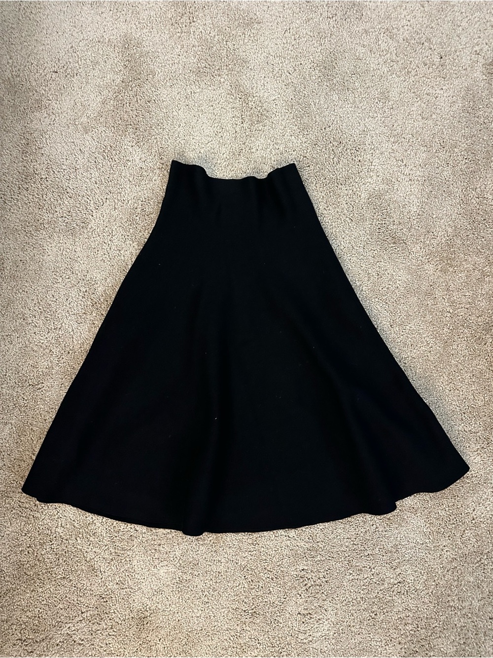 High-Waist Black A-Line Midi Skirt - Sleek Flared Silhouette